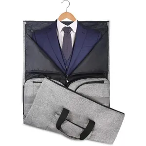 Close-up detail of the portable foldable garment bag with suit compartment and handles.
