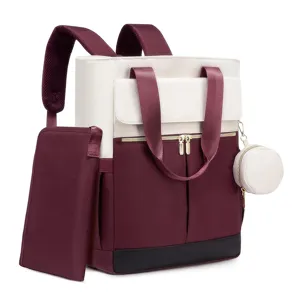 Details of the multi-functional diaper backpack with dual handles and matching pouch.