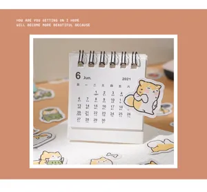 Cute cartoon shiba inu desk calendar and planner stickers set for daily journal decoration.