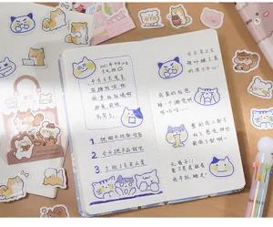 Cute cartoon cat stickers and diary notebook set ideal for DIY journaling crafts.