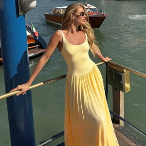 Fashionable slim-fit long pleated vest dress with spliced design, perfect for elegant summer wear.