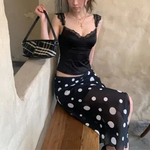 Sexy mesh polka dot print irregular midi skirt for women, stylish autumn fashion apparel.