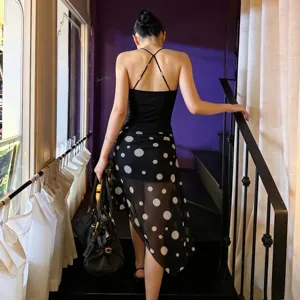 Detailed view of women sexy mesh polka dot irregular skirt fashion autumn slim apparel back view