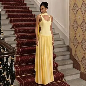 Women's yellow slim long pleated vest dress with spliced ribbon detail for daily elegance.