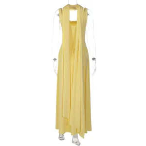 Detailed view of a light yellow sleeveless long dress featuring an elegant neck tie drape design.