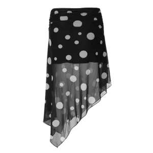 Close-up detail of the black mesh skirt featuring classic white polka dots and an elegant asymmetric hemline.