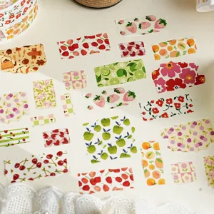Exquisite botanical and fruit washi tape details, featuring strawberry and floral stickers.