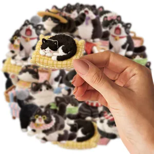 Black and white cow cat PET sticker detail view, cute sleeping kitten journal collage.