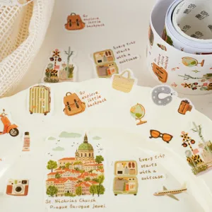 Close-up detail of travel-themed decorative washi tape and cute illustrated stickers set.