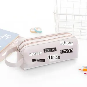Rosa Federtasche mit doppeltem Reissverschluss und minimalistischen Aufklebern, Etui