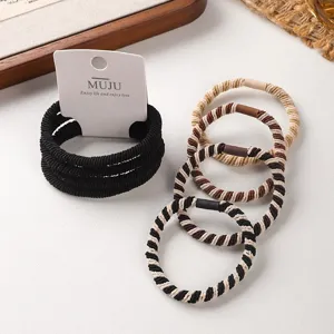 Set of durable elastic hair ties and stylish striped hair scrunchies for secure daily styling.