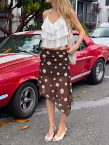 Chic women's brown polka dot mesh irregular skirt with white ruffle halter top street style