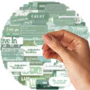 Detail view of aesthetic green quote stickers featuring inspirational lifestyle phrases.