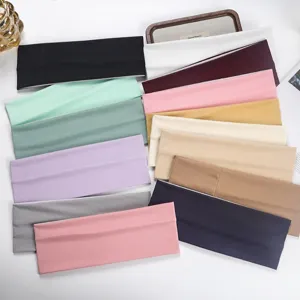 Close up of various colorful ribbed athletic headbands, stretchy sweat bands for sports wear.