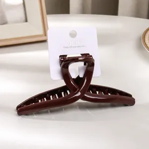 Pince à cheveux rouge Ancolara avec emballage carte, pince élégante pour coiffure quotidienne.