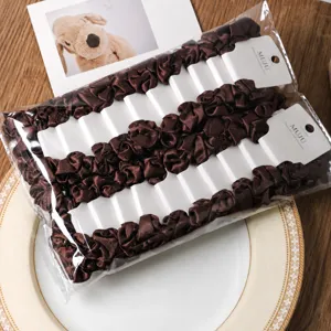 Brown satin scrunchies hair ties set with white display cards for daily styling and elegant looks.