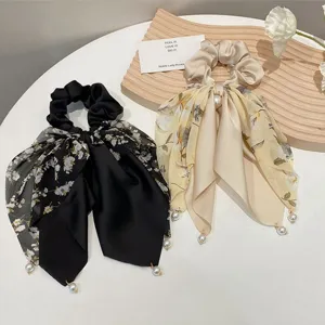 Korean floral bow scrunchies with elegant pearl pendants for women hair accessories.