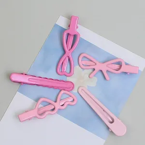 Joli set de pinces à cheveux en métal rose, style doux pour frange et coiffure.
