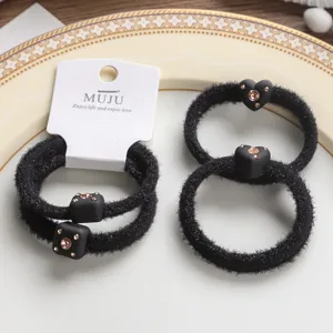 Black fuzzy hair ties with sparkling rhinestone charms, elegant elastic hair bands.