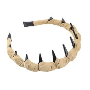 Cerchietto per capelli in tessuto beige con denti in plastica nera per styling quotidiano e viso