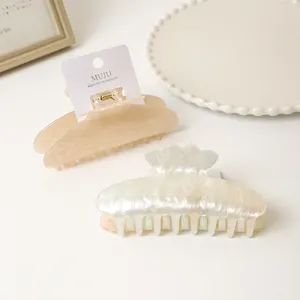 Imitation acetate hair claw clips set, elegant marble and shell design shark clips for women daily.
