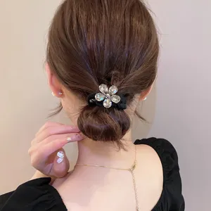 Crystal rhinestone flower hair scrunchie, elegant black fabric hair tie for women and girls.
