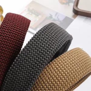 Close-up detail shot of wide knitted woolen hairbands showcasing autumn winter solid colors.