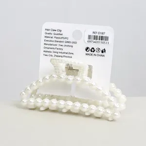 Pearl hair claw clip for women, elegant hair accessory with secure card packaging, perfect style.