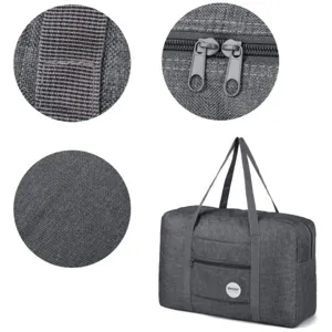 Sac de voyage gris foncé pliable bagage à main avec tissu durable et fermetures éclair robustes.