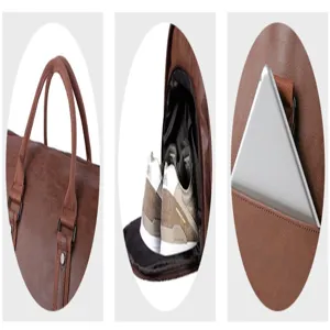 Detail shot of brown leather travel duffel bag showing handle, shoe compartment and pocket.
