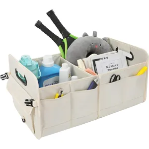 Foldable car trunk organizer with multiple compartments and side pockets for neat storage.