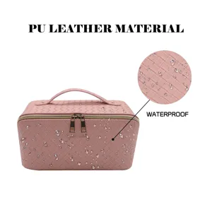 Pink woven PU leather cosmetic bag with handle and waterproof surface for daily travel storage.