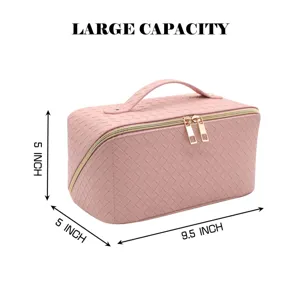 Pink woven cosmetic bag with handle, large capacity travel makeup organizer for daily use.