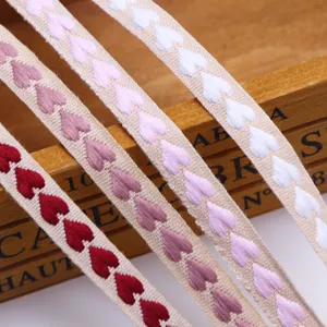 Heart embroidered ribbon for gift wrapping, wedding decoration, DIY crafts, and apparel accessories.