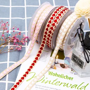 Heart embroidered ribbon detail, perfect for gift wrapping, floral arrangement, and DIY craft.
