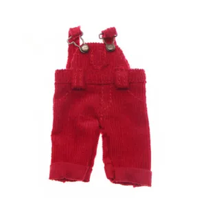 Miniature red corduroy doll overalls, detailed metal hardware, perfect for BJD and cotton dolls.