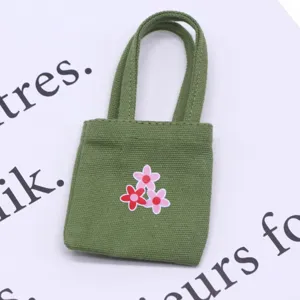 Miniature green canvas tote bag dollhouse accessory, floral print handbag for bjd scenes.