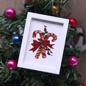 Miniature dollhouse Christmas wall art frame, perfect for ob11 doll room decor and festive mini displays.