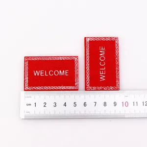tapis miniature welcome de maison de poupée 1:12 en tissu non tissé vue de détail.