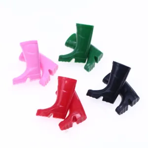 Miniature rain boots for dollhouse BJD OB11 micro scene gardening silicone shoes detail view