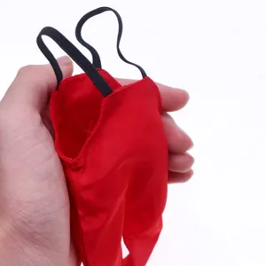 Miniature red overall pants dollhouse accessory for BJD dolls outdoor camping fishing scene decor.