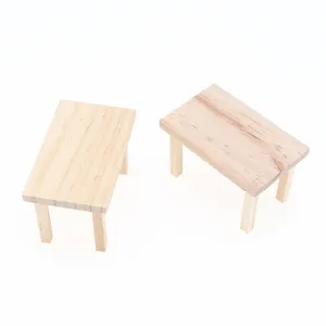 Detailed close-up of miniature wooden tables for dollhouse decor and photography props.