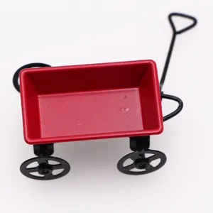 Miniature red iron cart dollhouse accessory, detailed metal wagon model for photography props.