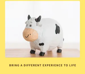 Cute wooden cow figurine detail, carved animal ornament for desktop decor, charming craft piece.