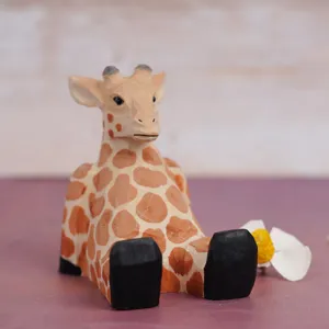 Handcrafted wooden giraffe phone stand, cute desktop ornament office decor for video watching.