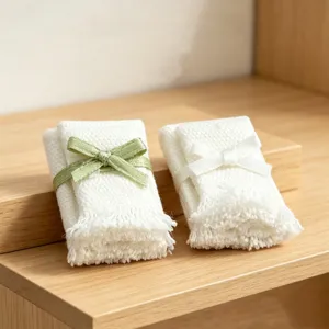Miniature dollhouse towel detail view, white fabric with bow fringe, perfect for BJD scenes.