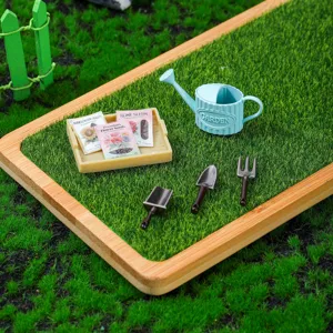 Dollhouse miniature gardening tool set details, mini plant watering can and tiny tools.