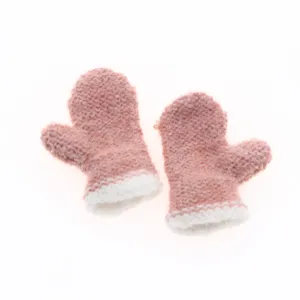 Mini knitted pink mittens with white cuffs, perfect for Christmas tree decoration and crafts.