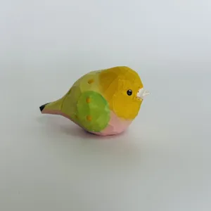 Handcrafted wooden bird ornament for desktop decoration, cute hand-carved healing home decor.