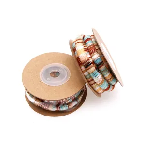 Detailed shot of 6mm ethnic core-spun cord with colorful stripes for DIY pet collars and crafts.